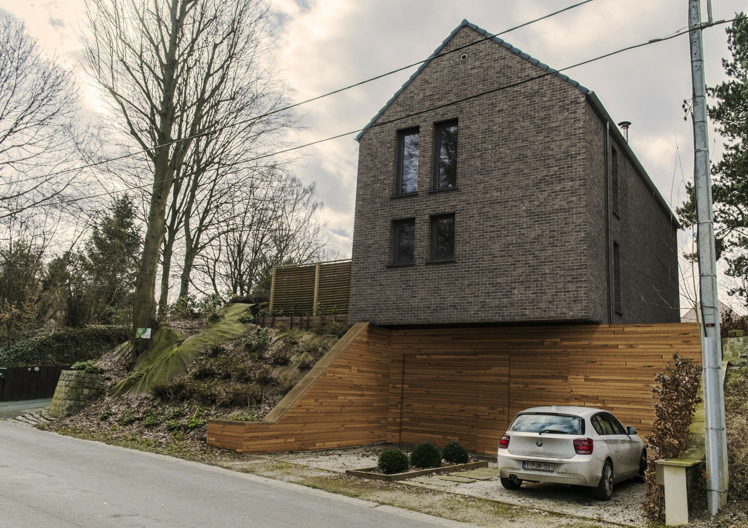 Maison passive en ossature bois terminée dans le Brabant wallon – architecture compacte et bioclimatique